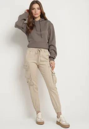 Pantalon cargo beige avec taille élastique multi poches