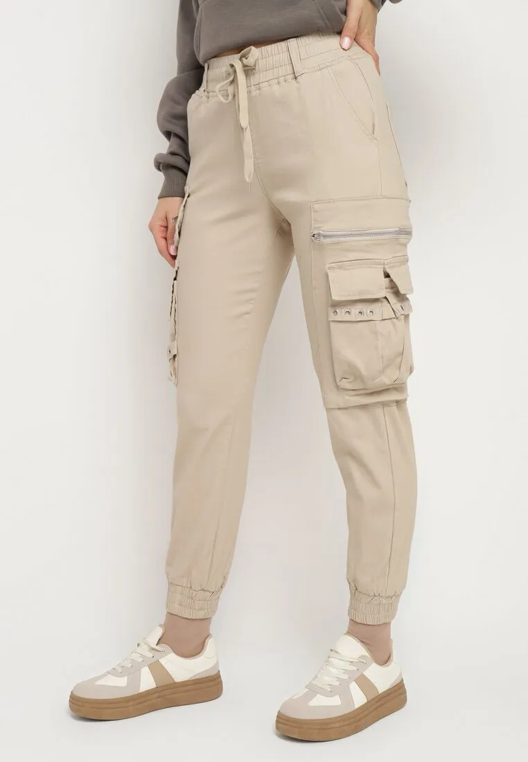 Pantalon cargo beige avec taille élastique multi poches