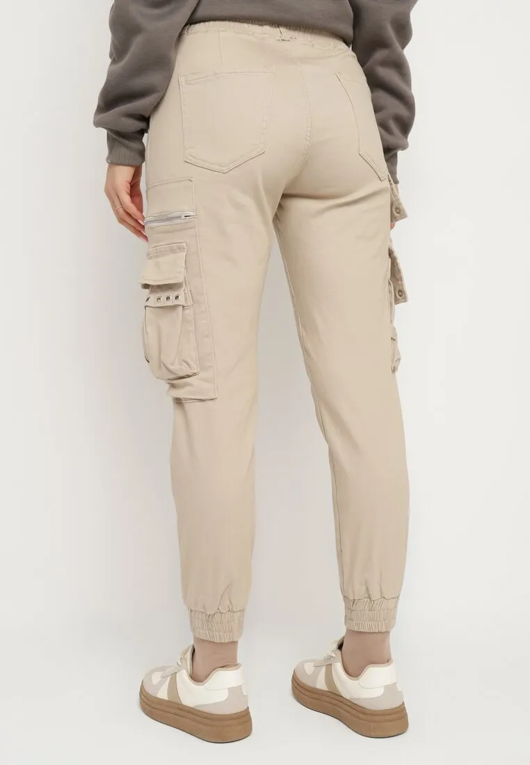 Pantalon cargo beige avec taille élastique multi poches