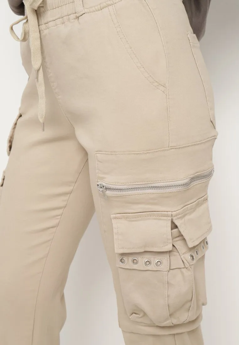 Pantalon cargo beige avec taille élastique multi poches